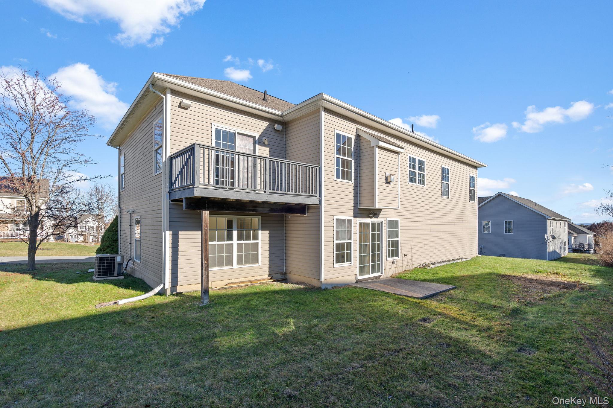 17 Carmella Road Highland, NY 12528 - Photo 43 of 48 Back of property featuring a lawn and a deck