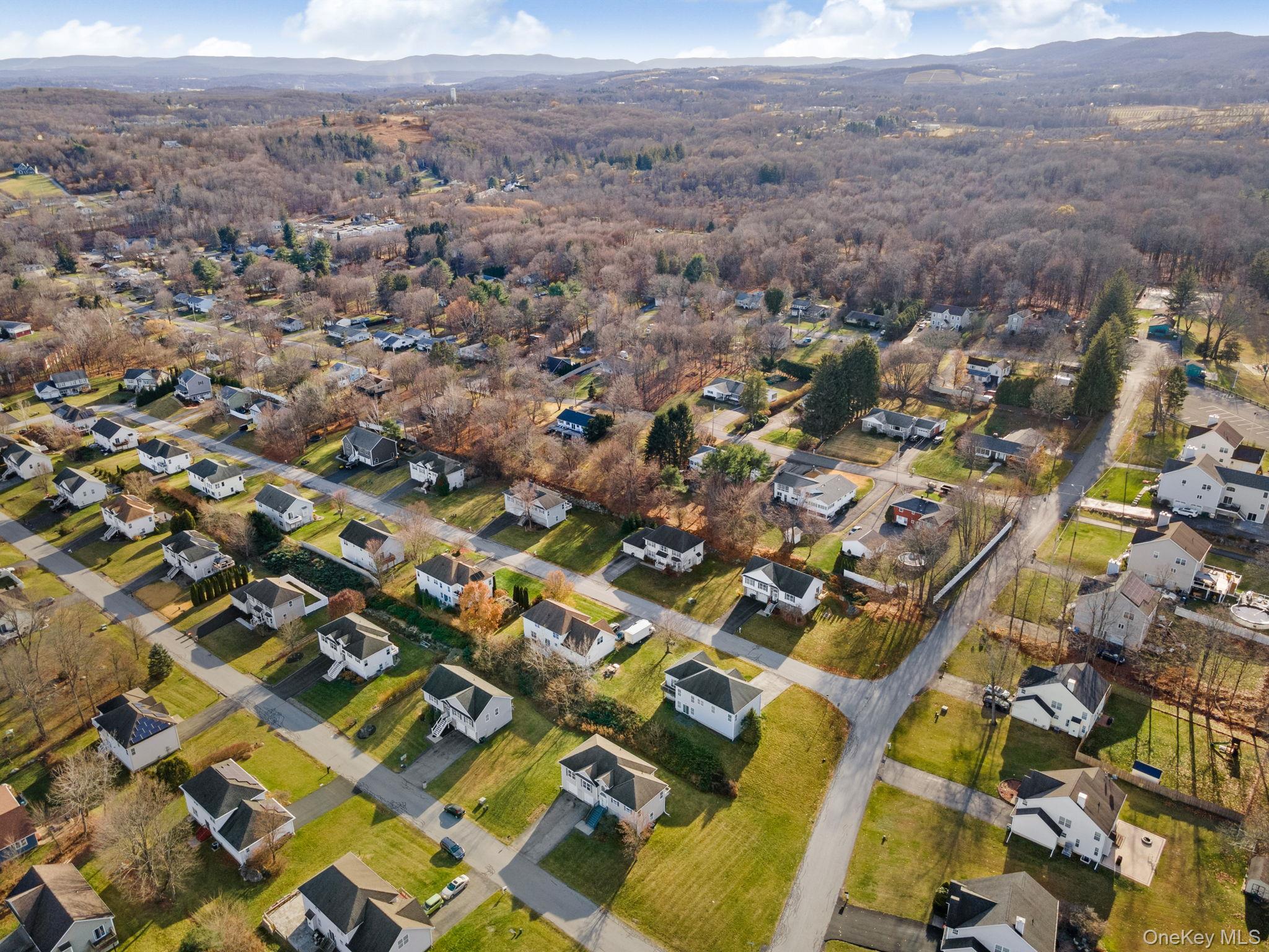 17 Carmella Road Highland, NY 12528 - Photo 48 of 48 Aerial overview of property's location featuring nearby suburban area and a mountain backdrop