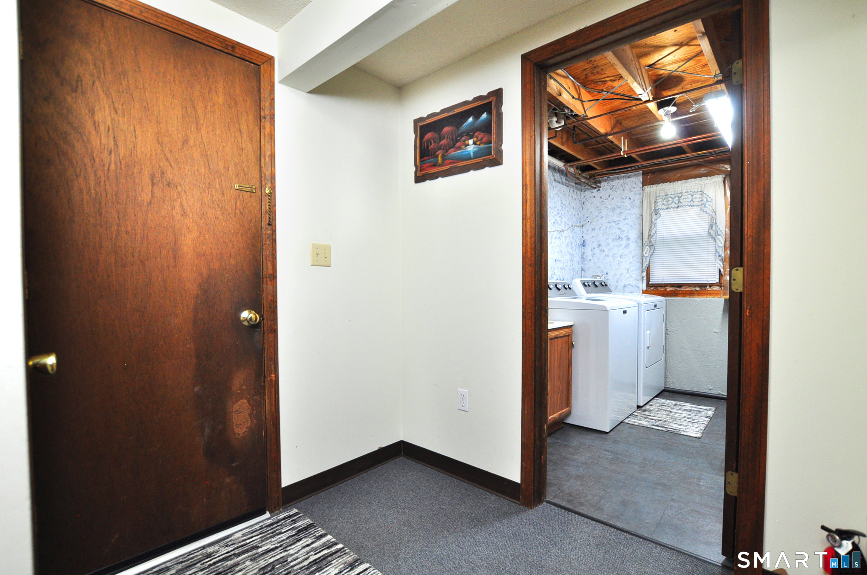 20 Lawrence Lane Torrington, CT 06790 - Photo 35 of 40 Half bath and entrance to garage