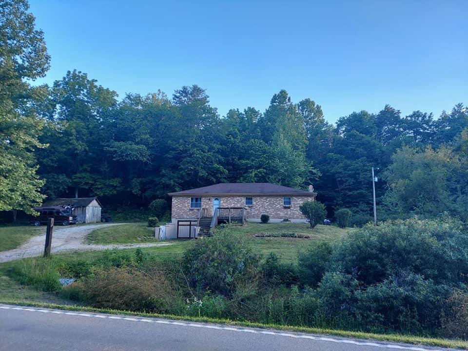 7695 Winchester Road Irvine, KY 40336 - Photo 1 of 14 00CDCA23-6EB4-4BB3-A8DB-3122ECA99998