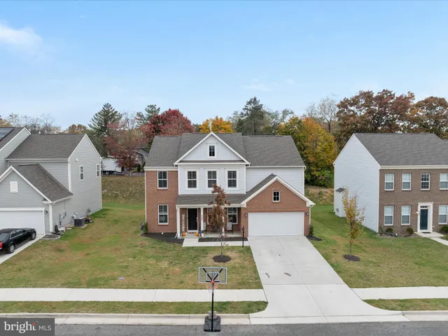 an aerial view of a city with lots of residential buildings