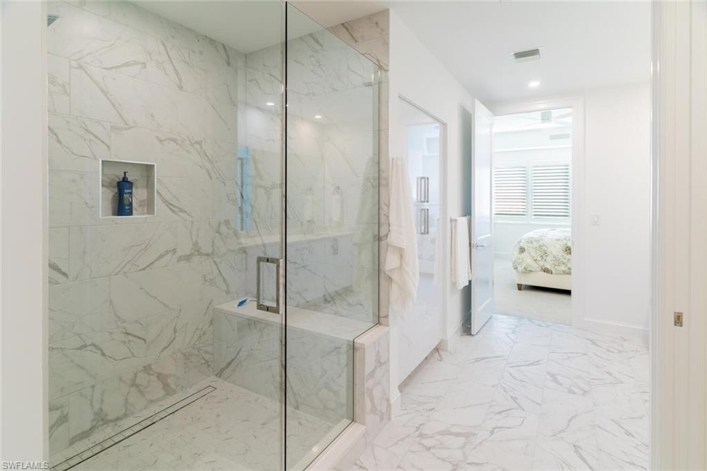 1125 Central Avenue, Unit 373 Naples, FL 34102 - Photo 24 of 49 a bathroom with a shower