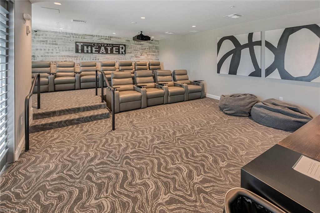 1125 Central Avenue, Unit 373 Naples, FL 34102 - Photo 44 of 49 a bedroom with a bed and walk in closet