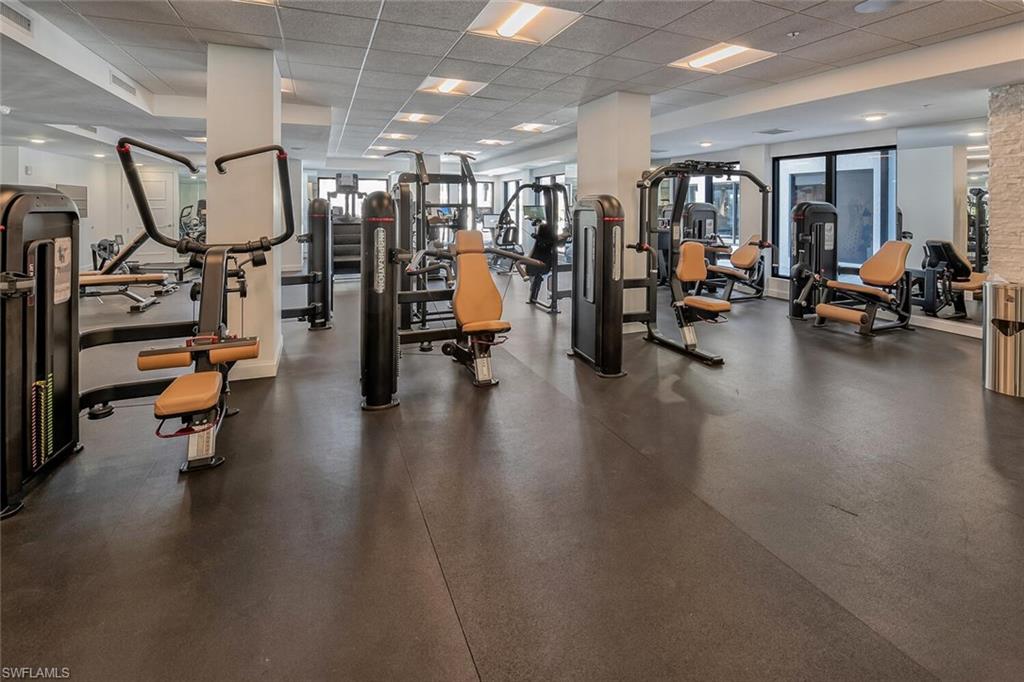 1125 Central Avenue, Unit 373 Naples, FL 34102 - Photo 45 of 49 a view of a room with gym equipment