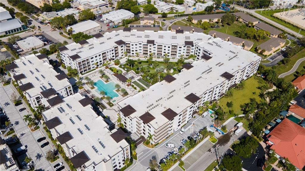 1125 Central Avenue, Unit 373 Naples, FL 34102 - Photo 49 of 49 an aerial view of residential houses with outdoor space
