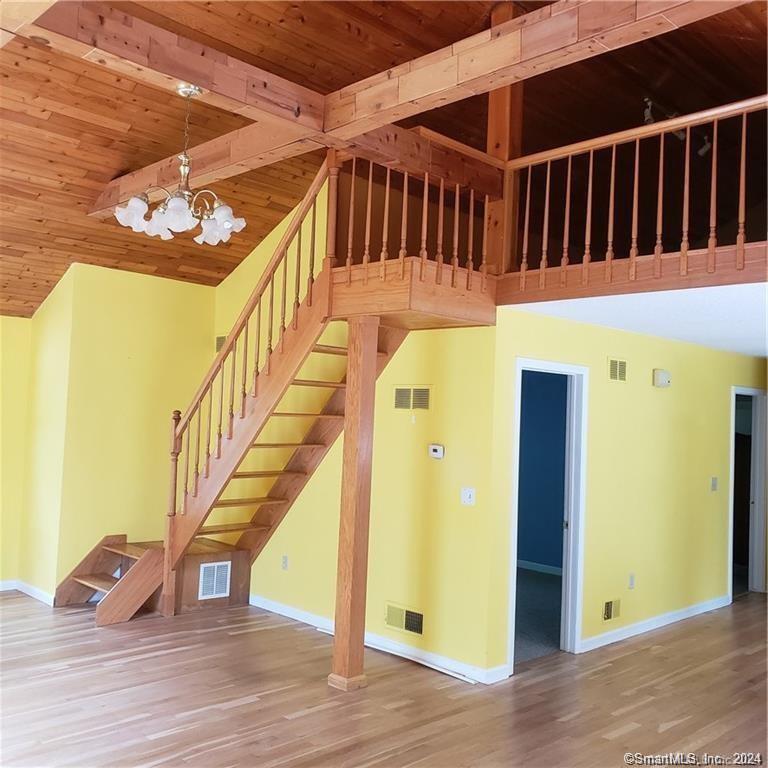 a view of entryway with wooden floor