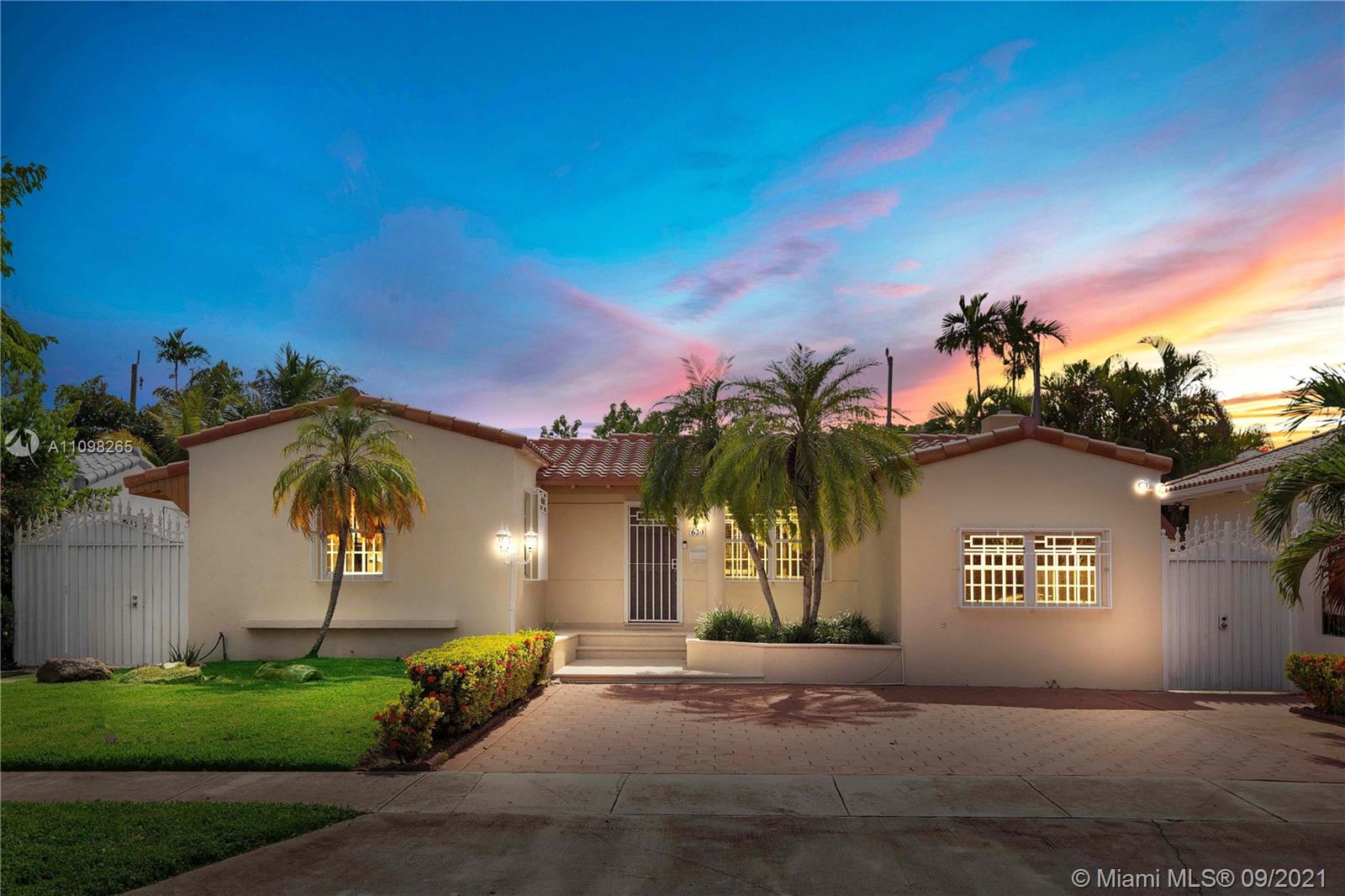 a view of a house with a street