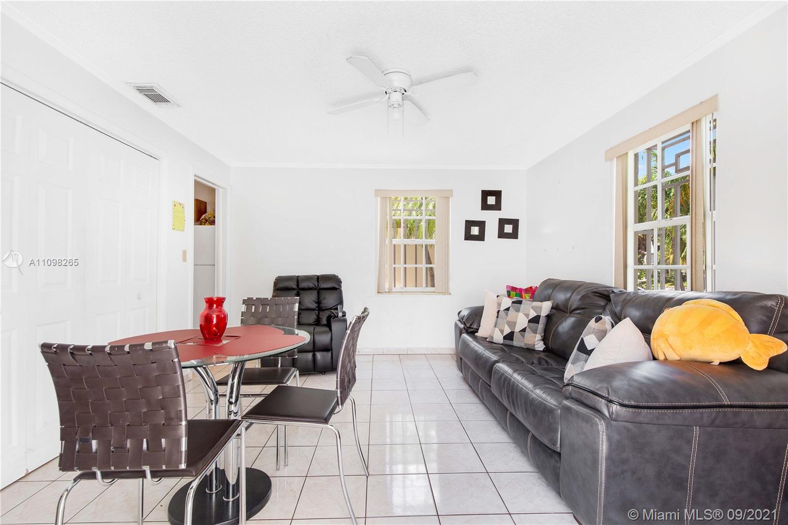 620 Southwest 22nd Road Miami, FL 33129 - Photo 14 of 53 a living room with furniture and window