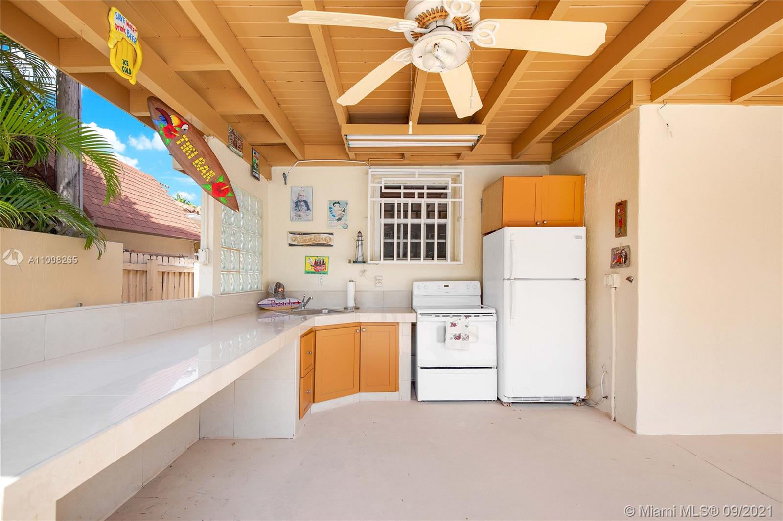 620 Southwest 22nd Road Miami, FL 33129 - Photo 36 of 53 a view of a kitchen with appliances and cabinets
