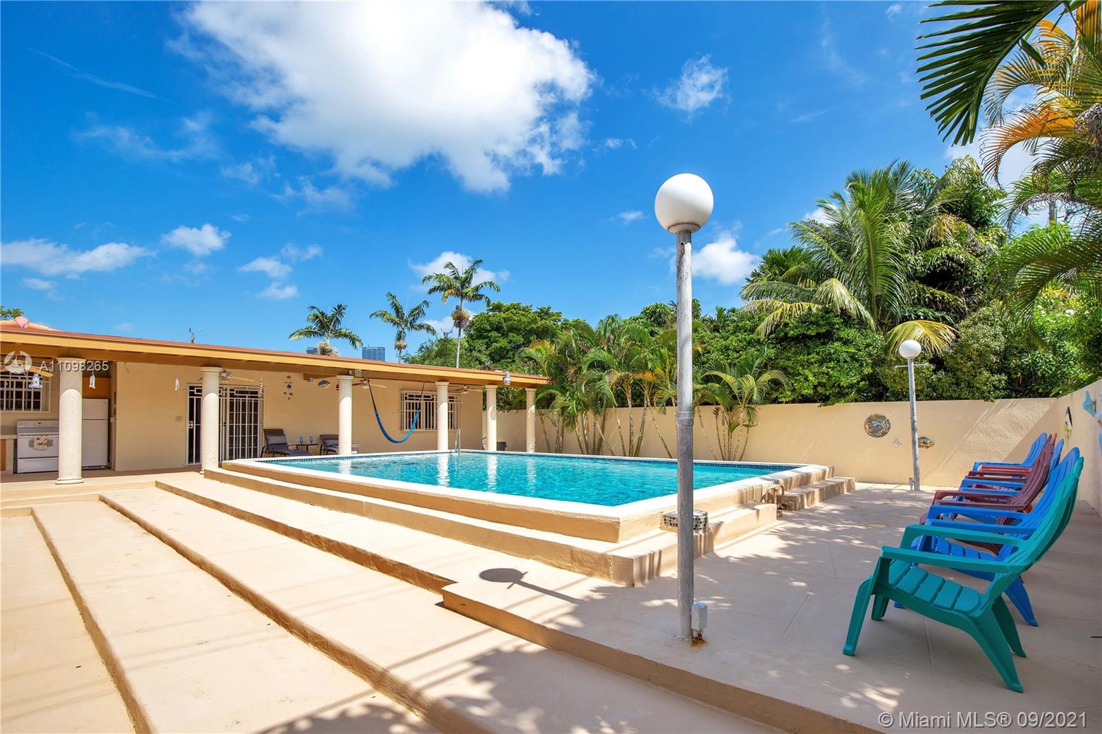 620 Southwest 22nd Road Miami, FL 33129 - Photo 42 of 53 a view of a house with a backyard porch and sitting area