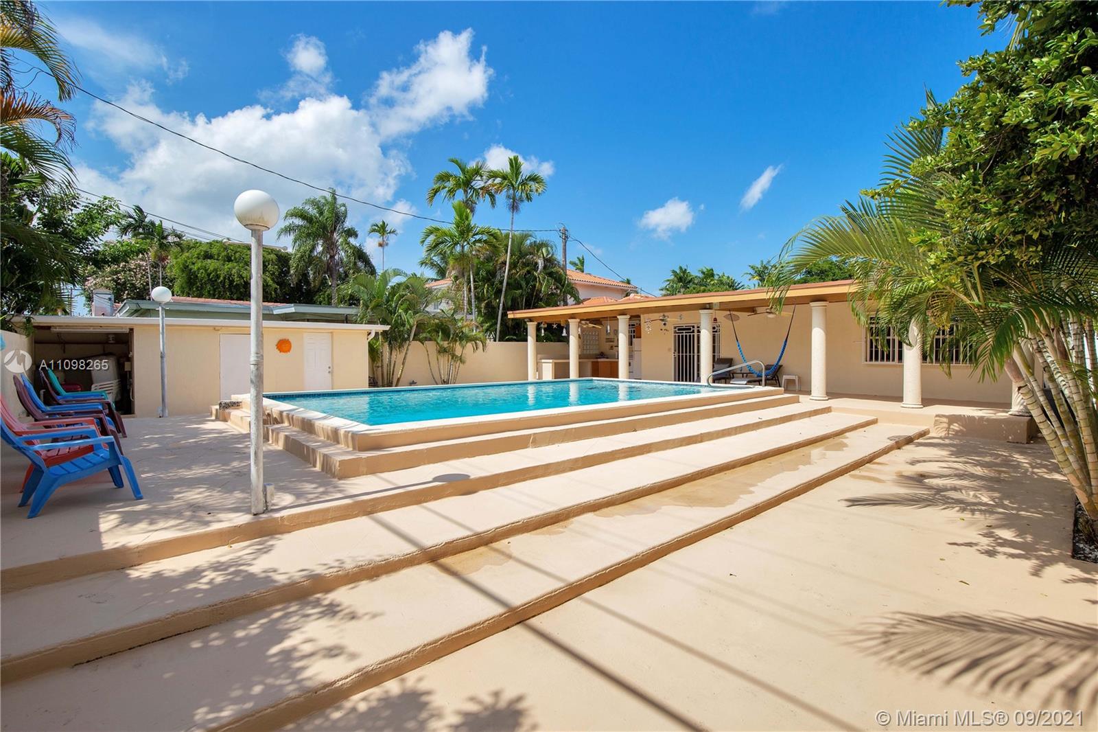 620 Southwest 22nd Road Miami, FL 33129 - Photo 46 of 53 a view of a house with a swimming pool