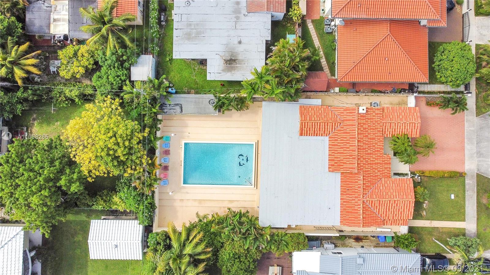 620 Southwest 22nd Road Miami, FL 33129 - Photo 47 of 53 an aerial view of a house with a yard and potted plants