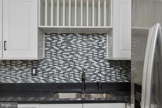 a bathroom with a glass door