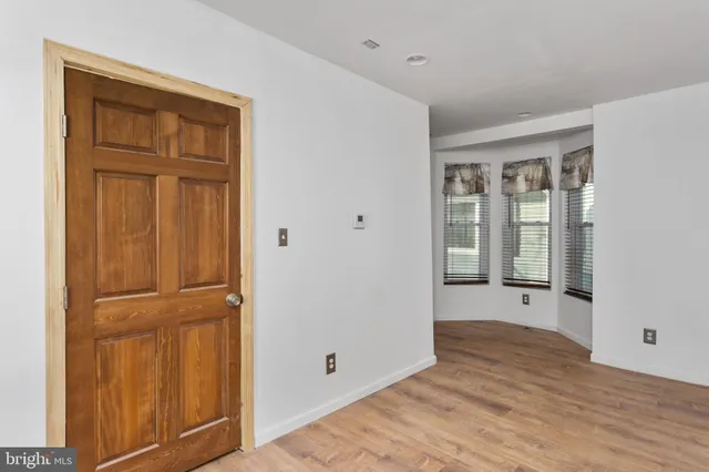 an empty room with window