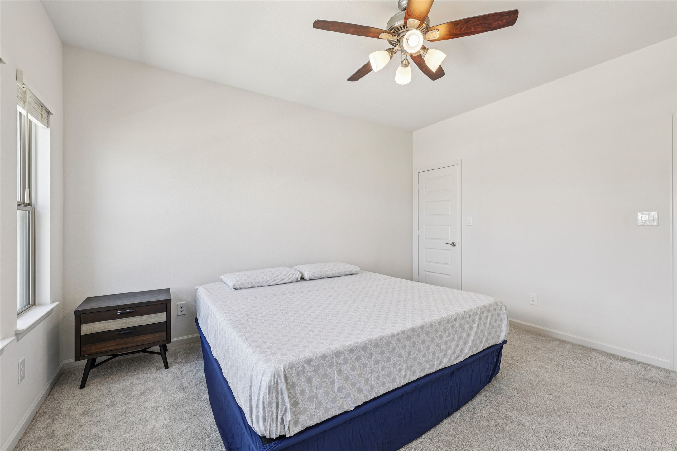 1140 Bryson Rdg Trail Leander, TX 78641 - Photo 28 of 39 This room features light-colored walls and grey carpeting