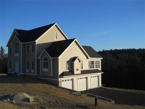7 Quail Ridge Road Merrimac, MA 01860 - Photo 2 of 14 a view of a house with a yard
