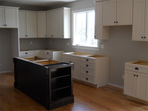 7 Quail Ridge Road Merrimac, MA 01860 - Photo 8 of 14 a kitchen with cabinets appliances and a window