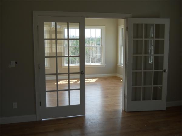 7 Quail Ridge Road Merrimac, MA 01860 - Photo 10 of 14 a view of wooden floor and windows in a room