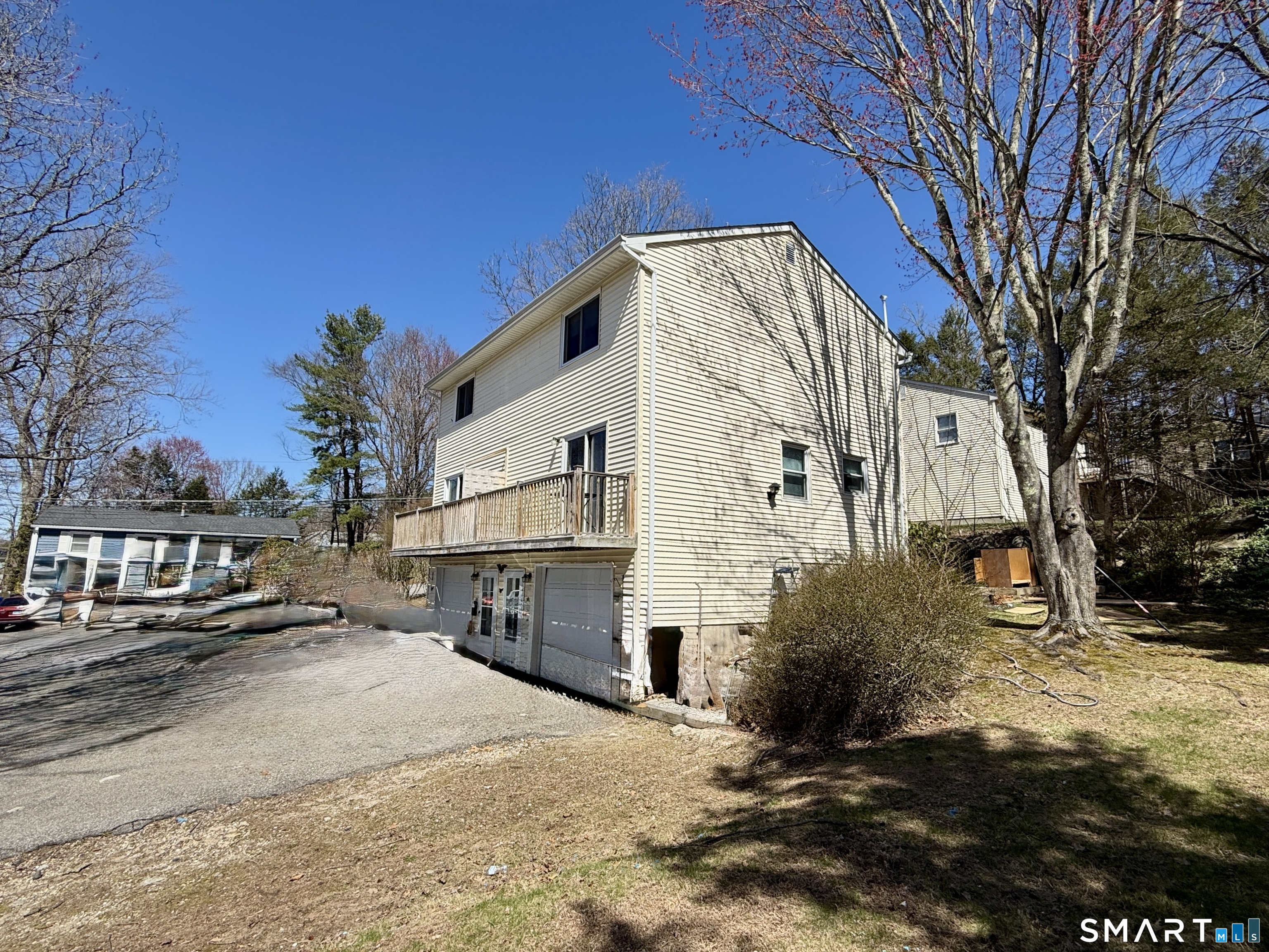 84 Wilmot Street Torrington, CT 06790 - Photo 13 of 18 a view of a house with a yard