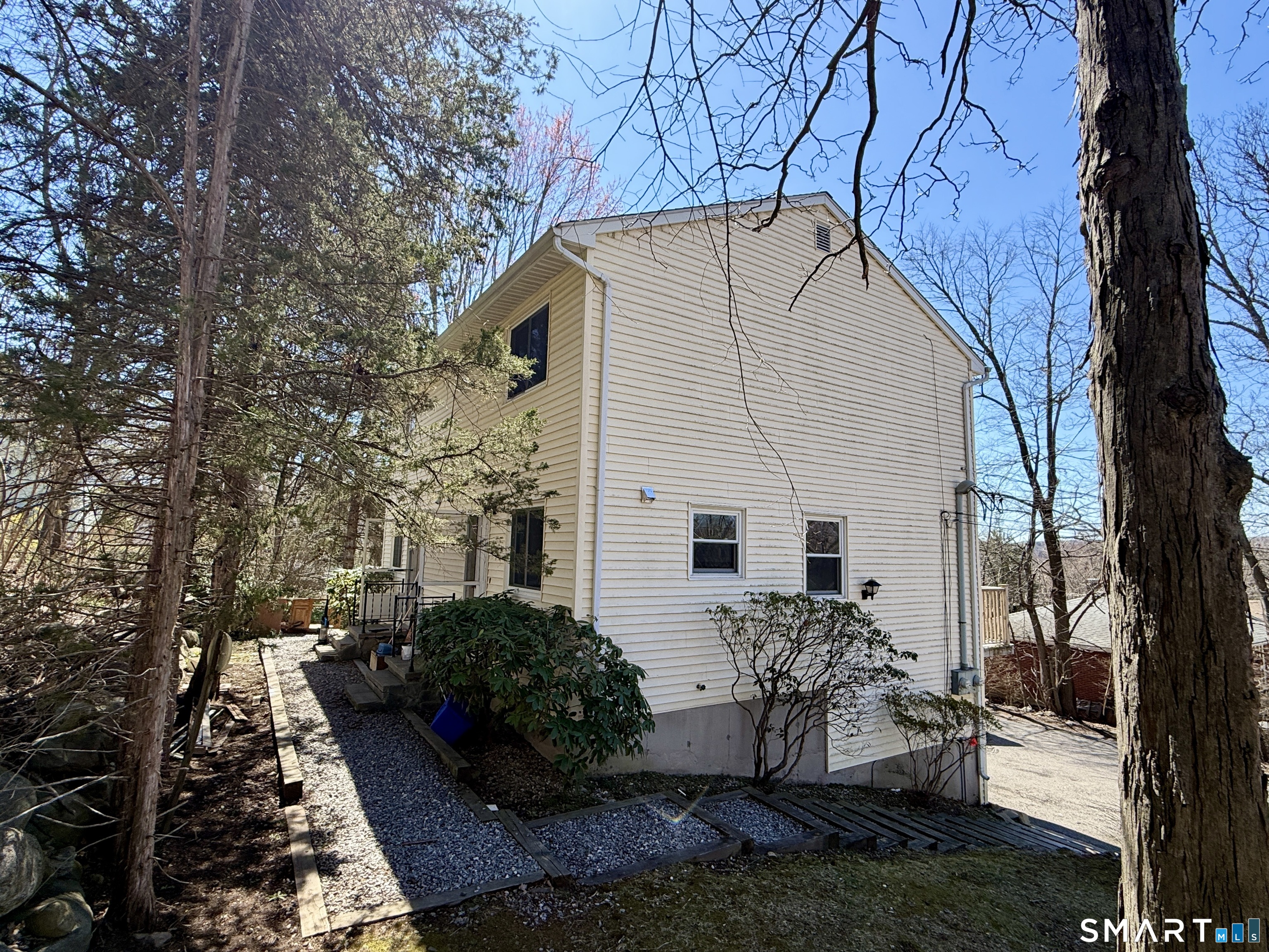 84 Wilmot Street Torrington, CT 06790 - Photo 14 of 18 a view of house with yard and sitting area