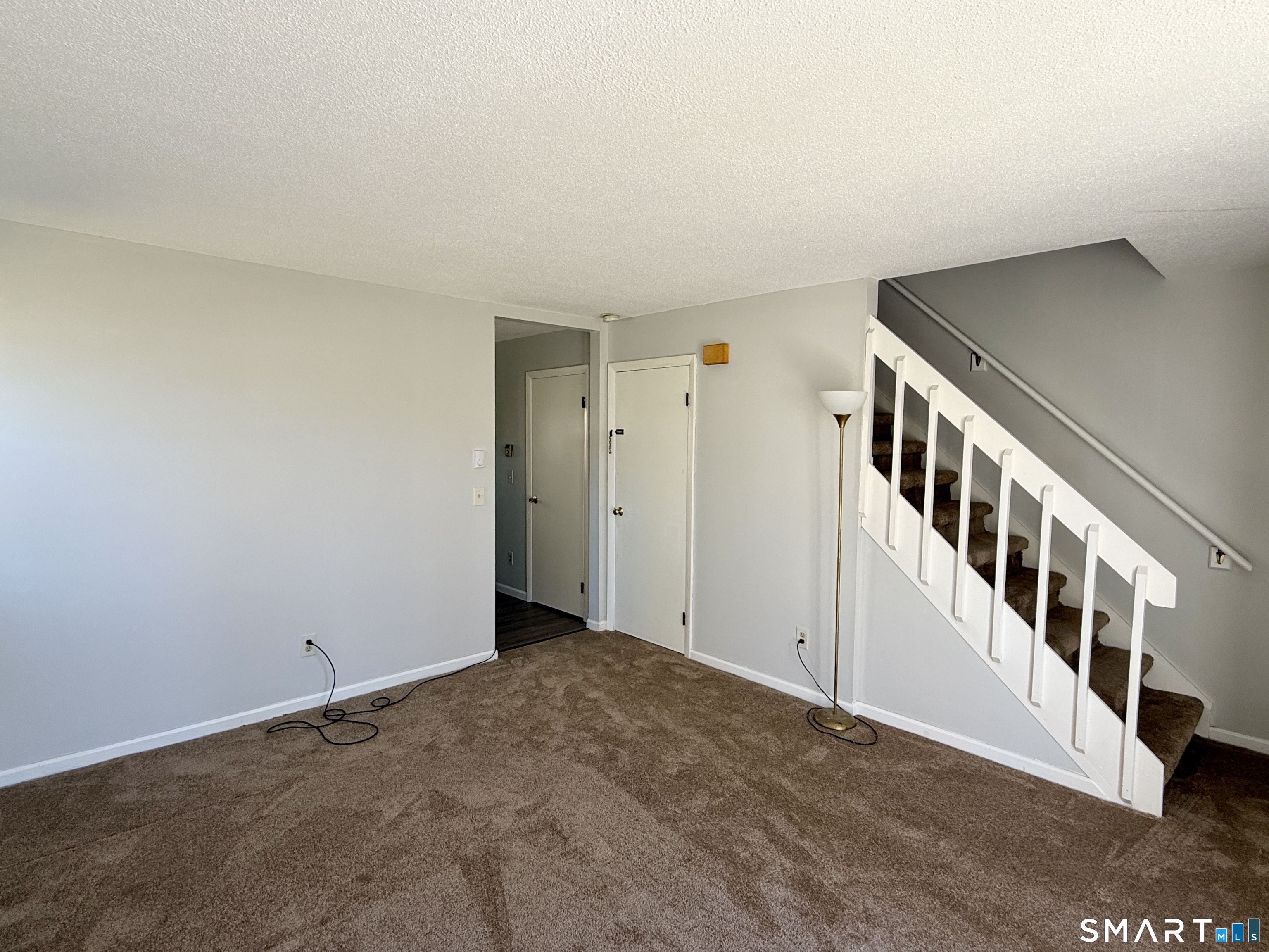 84 Wilmot Street Torrington, CT 06790 - Photo 4 of 18 a view of an entryway with stairs