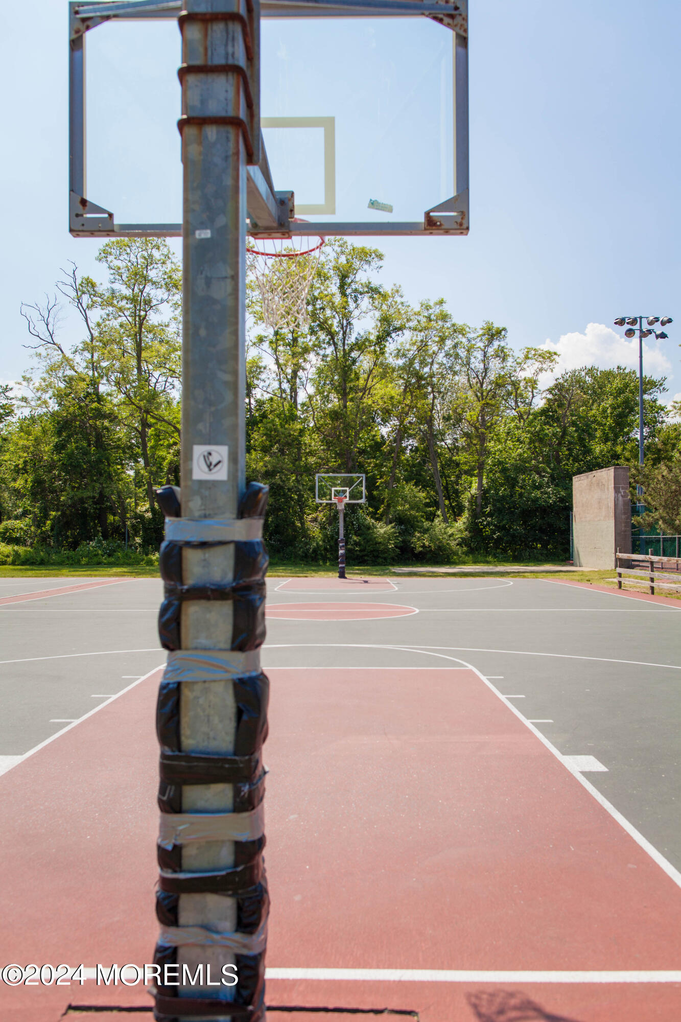 1302 Allaire Road Spring Lake Heights, NJ 07762 - Photo 13 of 20 a front view of a building with trees