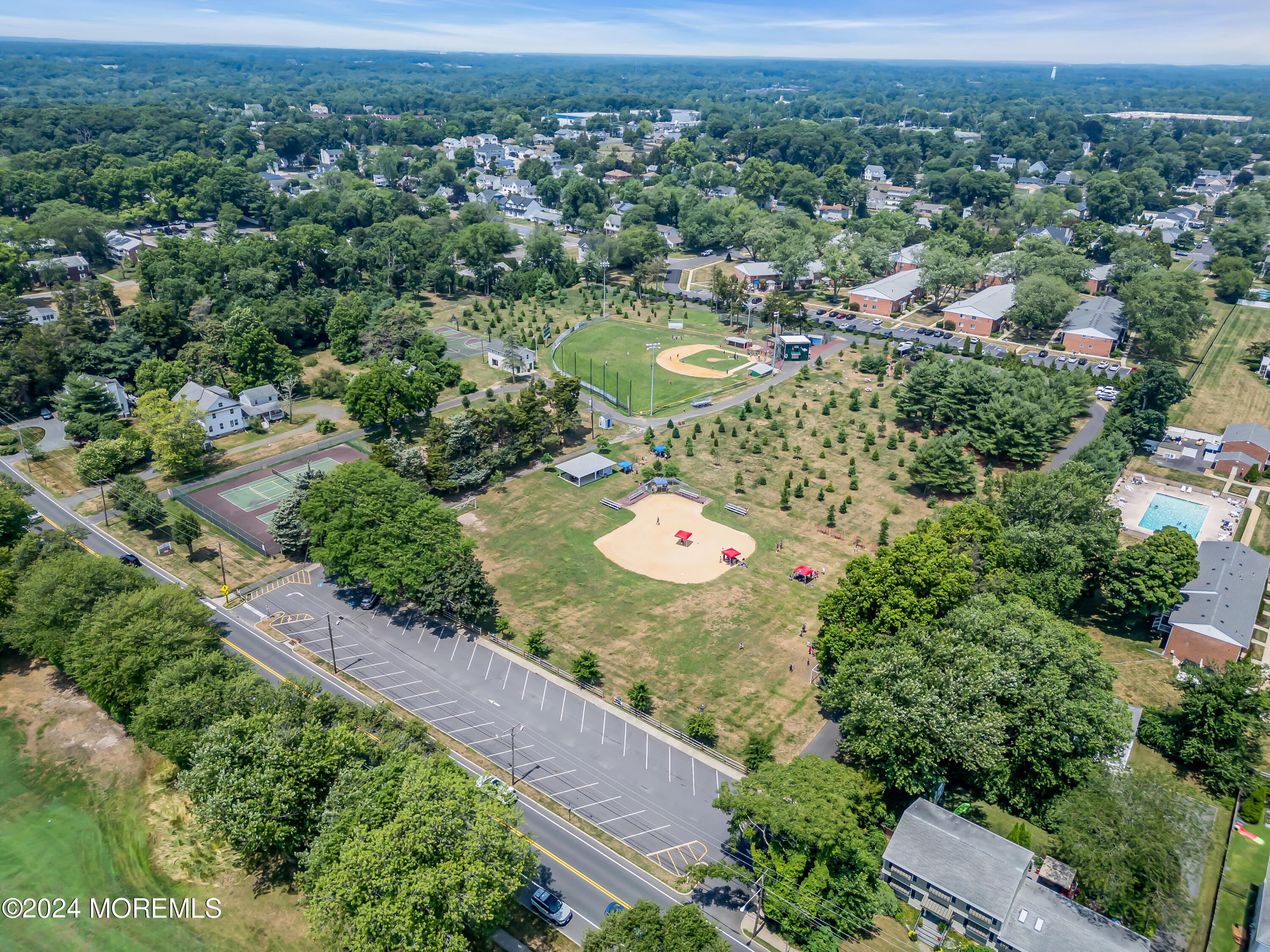 1302 Allaire Road Spring Lake Heights, NJ 07762 - Photo 17 of 20 an aerial view of a residential houses with outdoor space and trees