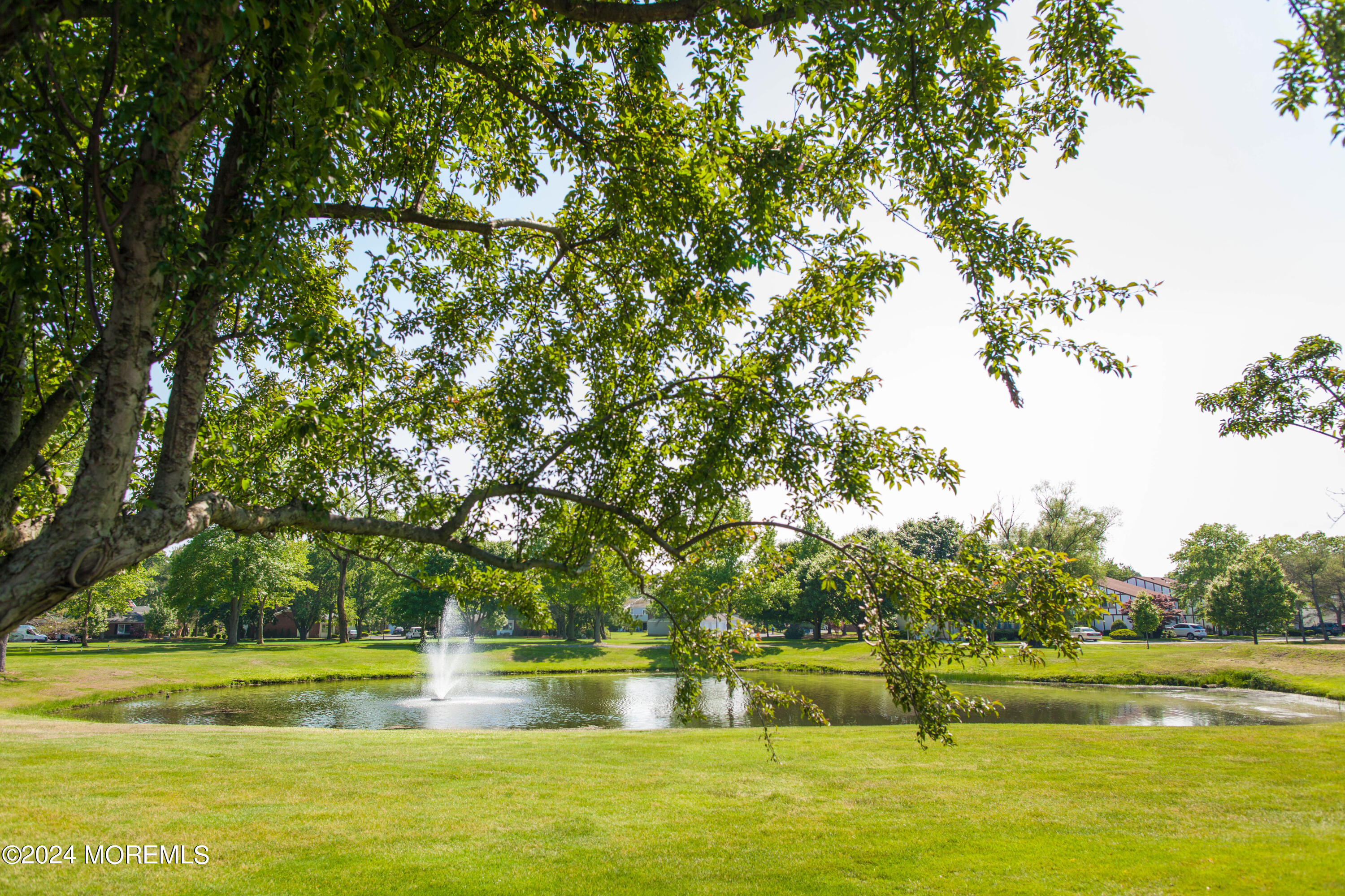 1302 Allaire Road Spring Lake Heights, NJ 07762 - Photo 10 of 20 a view of swimming pool with a big yard and large trees