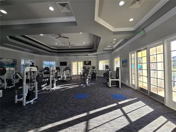 a room with lots of gym equipment