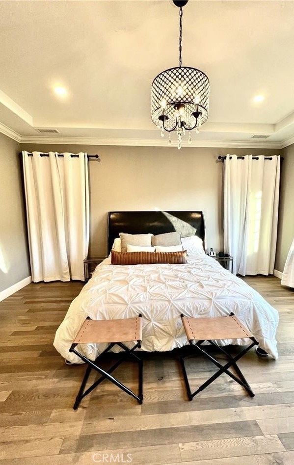 68 Chianti Irvine, CA 92618 - Photo 6 of 17 a bedroom with a bed and a table