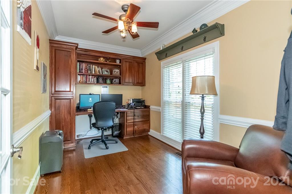 933 Ashford Way Fort Mill, SC 29708 - Photo 8 of 48 a view of a livingroom with workspace and a window