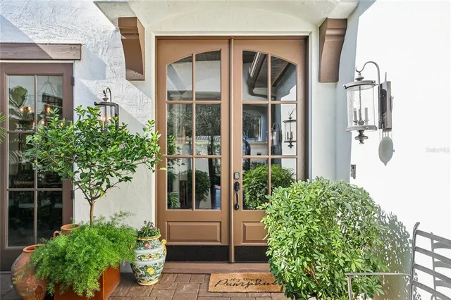 a view of a walk in closet and a bathroom