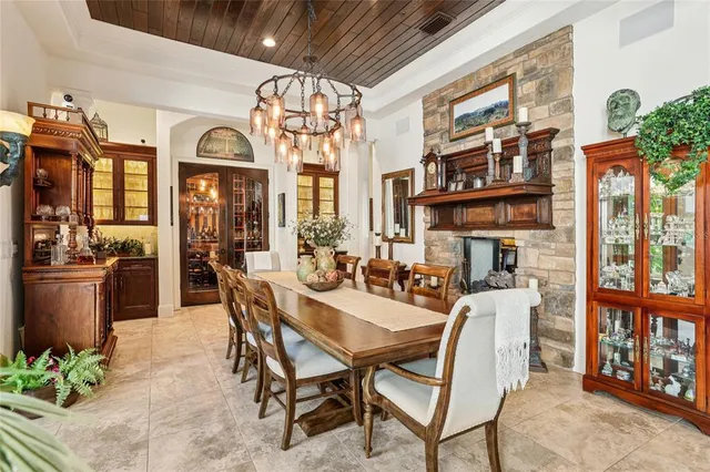 a outdoor space with lots of tables a garden view and chairs