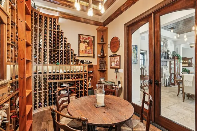 a kitchen with stainless steel appliances granite countertop sink stove and wooden cabinets