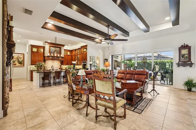 a kitchen with stainless steel appliances granite countertop a sink and cabinets