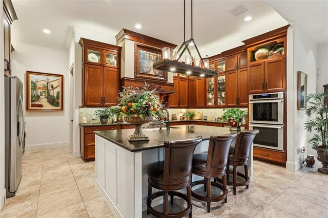 a large bathroom with a granite countertop shower a sink and a mirror