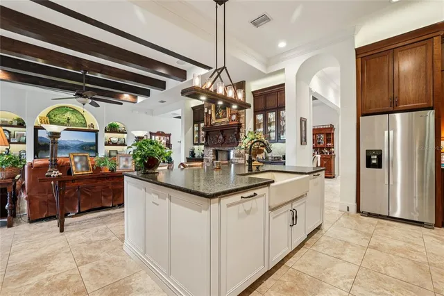 a bedroom with bed and wooden floor