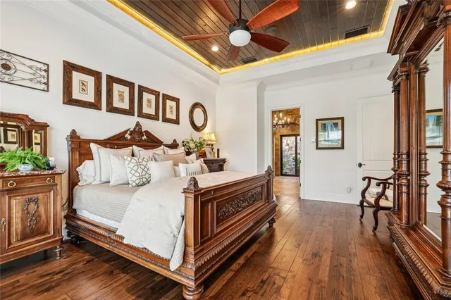 a bathroom with a shower a toilet and a window