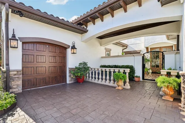 a view of a house with porch and furniture