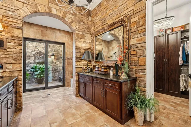 a bathroom with a toilet and shower