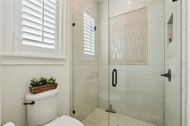 a view of a chairs and table in a patio