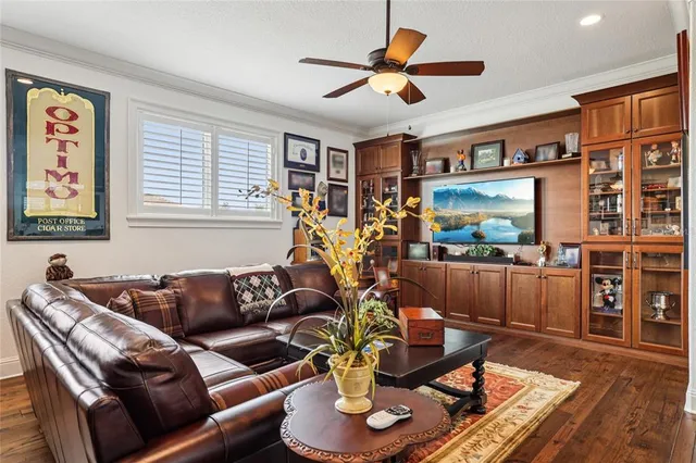a view of a patio with table and chairs and potted plants