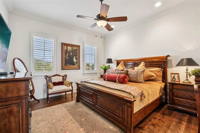 a dining room with furniture and a potted plant