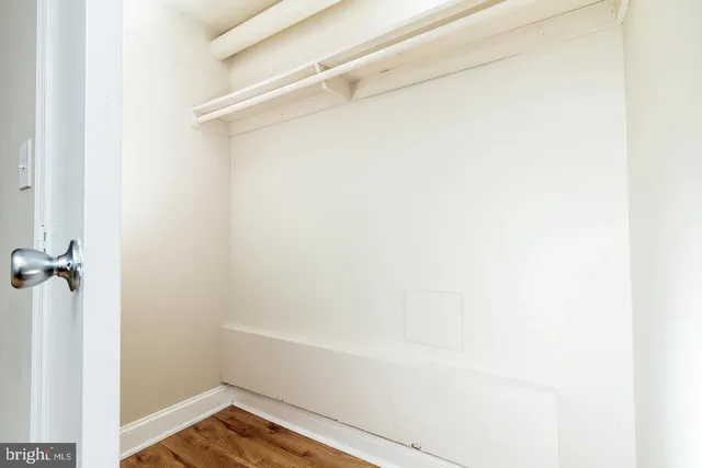 a view of an empty walk in closet