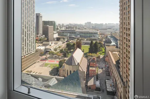 a bathroom with a toilet a sink and a mirror