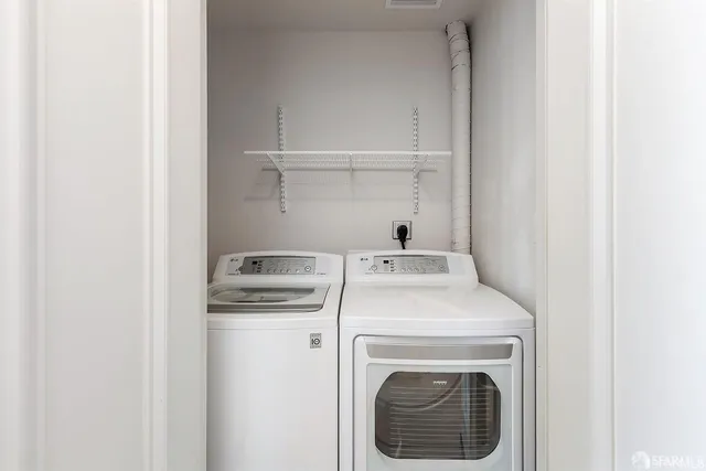 a view of a city with tall buildings in the background