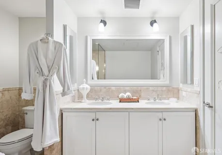 a bathroom with a sink and mirror