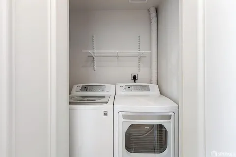 a view of a city with tall buildings in the background