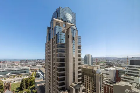 a view of city with tall buildings
