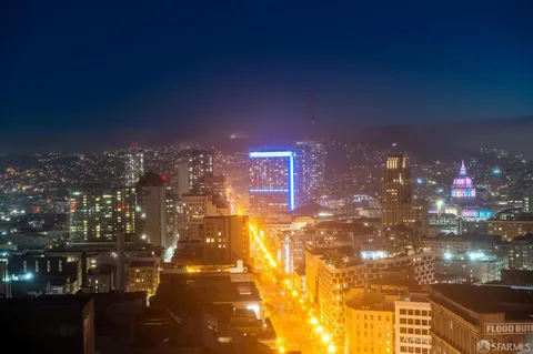 a view of a city with tall buildings